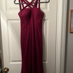 Maroon floor length prom dress, criss cross straps.